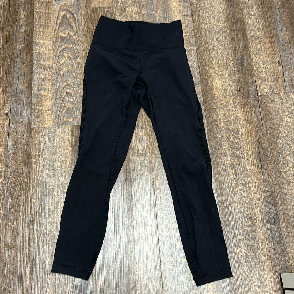Lululemon Leggins size 6, with lace down the leg
